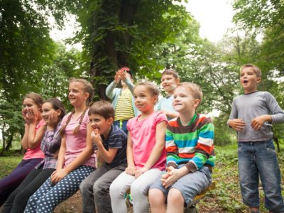 Group of children on a park bench